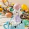 Glitzhome® Set of 2 Easter Resin Bunny on Tulip Mug Table Decor